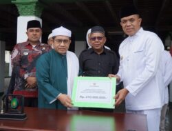 Jelang Haul Ke 101, Pj Bupati Langkat Serahkan Bantuan Jamaah Tuan Guru Babussalam